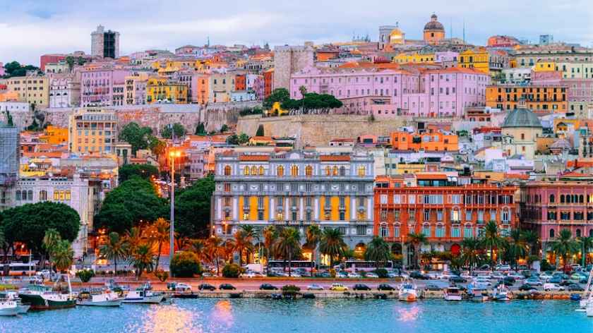 Cityscape with marina in the Mediterranian sea in the evening, Cagliari, Sardinia, Italy